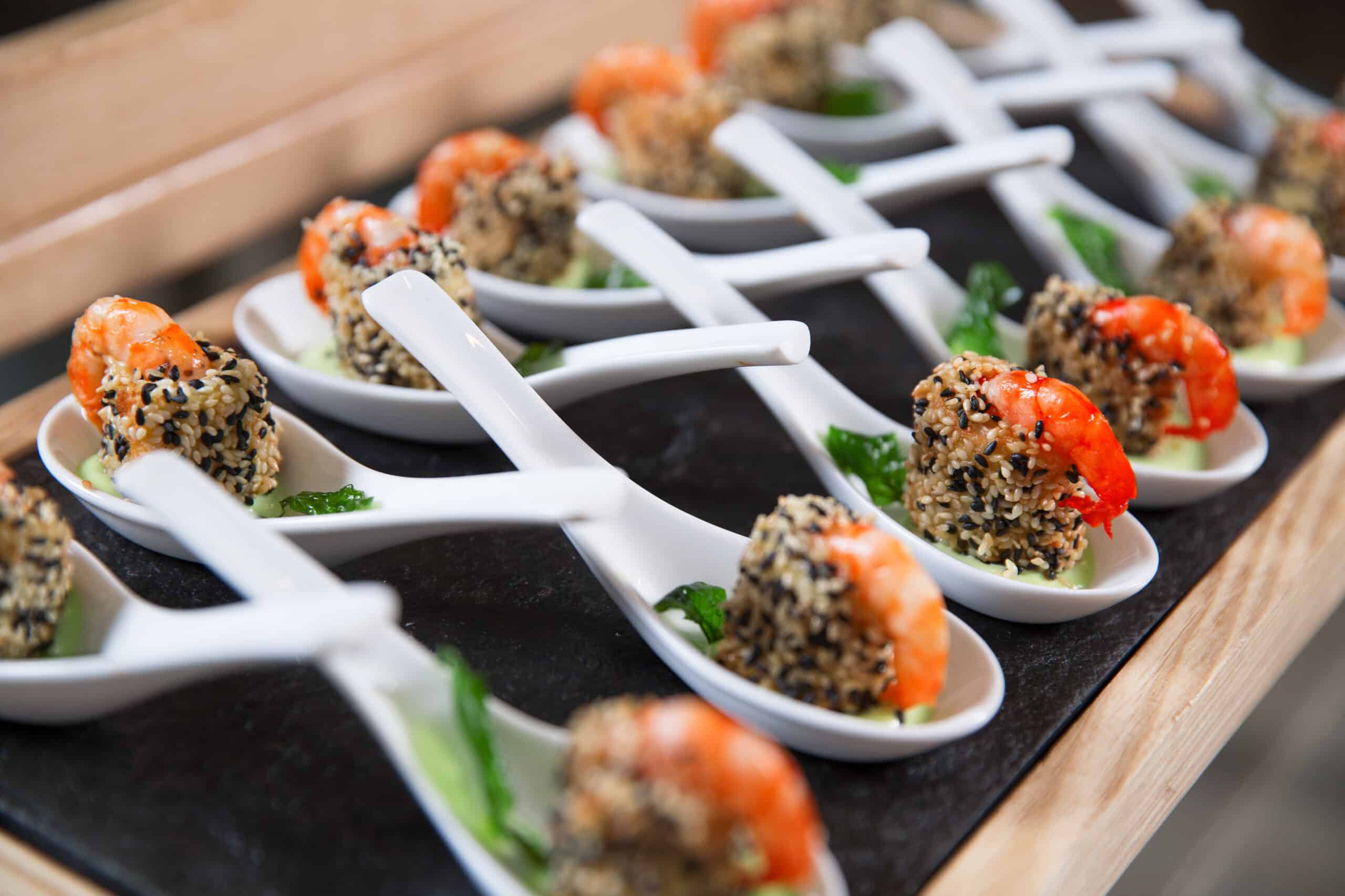 Snacks with Shrimps in Spoons on Buffet Table